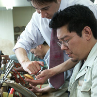15.  Our salesperson and responsible worker check colors minutely.